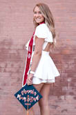 It fit true to size and it was super comfortable! I was worried about it being see through but it wasn't at all! I couldn't have picked a better outfit for graduation pictures! - Alyssa H.
