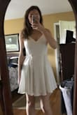 Overall, this dress fits very well. I ordered a small, but the top was still a bit loose, will wear a bra to fill it out better. - Abigail L.