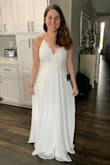 Beautiful material and was great shipping even with the Covid-19. It falls so elegantly that when I turn to the side it hides my slight tummy. Highly recommend! I don't trip over the length but I could wear heels if I wanted. Highly recommend! - Miranda J.