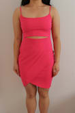 This dress is fun and flirty! The pink is a really pretty and bright color. A size S complements my (short) height perfectly, but you do have to be careful about it riding up when moving (I had to pull it down a little after moving around). The biggest con for me is the keyhole on the front it isn't super noticeable (on my body at least), unless I pull the dress all the way down or have the straps super tight. Sometimes you can't even tell there's a cutout, but I love the dress enough regardless! - Callie C.