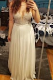 My wedding has been postponed, and my fiance and I decided to still get married on our date anyway with our immediate family, but my dress is locked away at the bridal shop awaiting alterations, so I order this stunning dress and it fits almost perfectly! I ordered a size 6 and the only thing is it's too long, but I'll just wear heels! - Kaitlyn M.