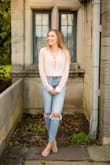 This shirt was perfect for my senior pics, but it is a little bit see through so definitely wear a cami underneath - Kate P.