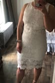 I go back and forth between ordering mediums and larges from Lulus. My top half is a lot smaller than my bottom half, but I took a risk ordering this in a medium. If I had sized up to a large the top would have been way too big. The skirt is a little tight around my waist but fits me perfectly every where else. Looking forward to wearing this to my bridal shower in July. I think the length of the skirt is very flattering and it looks more like a dress than two separate pieces on me, but I'm totally okay with that! - Ashley H.