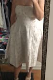 I bought this to wear for my rehearsal dinner this fall. The top is a little tight, but it was on super sale when I ordered it and if I had sized up, it would've been too big every where else. - Ashley H.