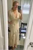 I bought this dress thinking I might use it for my rehearsal dinner but since my wedding got postponed to August because of the virus it might be better to go with a shorter dress. I love this dress so much though that I'm going to wear it to my bridal shower!! It's a little more form fitting on the hips then I thought but I actually like it like that because it gives you a shape!! Very flattering and happy with my purchase - Alyssa E.