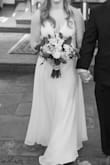 I initially bought this dress to change into something more comfortable for our after party. Unfortunately, COVID 19 cancelled our wedding just 5 days before. So we decided to still get married on that day and I wore this dress. I got SO many compliments and people thinking this was my actual wedding dress! I have an athletic build and broad chest/shoulders so I loved that the straps are adjustable. I did have to get it hemmed and have cups put in. I am so thankful I purchased this dress, for many reasons!! - Lauren P.