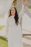 My original wedding date was affected by COVID19. My husband & I still decided to elope on our original date, but I didn't want to wear my actual wedding dress (since we are still having a full wedding reception). I ordered this dress like a week in advance, so I was worried how it was going to turn out. It was absolutely perfect! The fit, the length, the design. 10/10 recommend. - Hailey B.