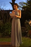 I wore this dress to my sister's wedding and got many compliments on it. The dress fits very well, but was a bit long, even with high heels! I would recommend getting it hemmed. It is comfortable and very well priced compared to many other bridesmaid dresses. - Sarah M.