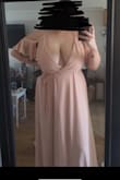 Way too much cleavage to be able to wear if you have large boobs. - Dalyce G.