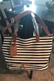 Absolutely love this bag. Great quality and enough room for all my items - Melina Z.