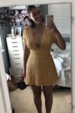 I LOVE this dress. It's absolutely stunning and flows very nicely. It's a good length; at 5'10", I usually find that "mini" dresses show a little too much booty for my taste, but this sits below my finger tips. It's a tasteful balance to the incredibly low cut neckline- pictures are with and without a bra so you can see how it hangs. It'll take a bit of getting used to, but bc it's lined it is perfectly fine to wear without a bra - I just need to build up the confidence! - Sabrina D.