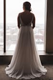 Ordered for my wedding and it was perfect! I didn't have any alterations done to it at all. I wore about 3 inch heels and the length was about perfect. I probably could have had three straps taken in the tiniest bit but decided against it and I was still fine all night. Very comfortable, easy to dance in. Got so many compliments! - Allison S.