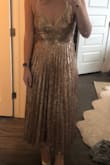 I bought over 10 items to try for my sisters wedding. This dress was the winner. Quality is great and it's also comfortable. Looks way more expensive than it is. - Annie P.