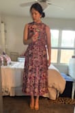 I am very happy with this dress. I love the colors and pattern and don't have anything quite like it in my closet. I like when others include reviews with photos/measurements because it helps me decide what size to purchase, especially because my measurements almost always suggest  I should buy a L (maybe M) but I usually wear a S, sometimes M. The waist is elastic and so I decided to go with a small and am content with the size. If I remember correctly, others said the dress makes you look bigger, and it is more flattering with a belt, and I would have to agree with both statements. That being said, I still love the dress and would purchase again! - Alexia K.