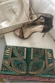 This clutch with its deep green velvet embellished in bronze with a streak of pink is the perfect accessory for a wedding or date night!!! Still working on date night but the wedding I attended it was a hit. - Francine E.