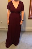 Decided between this and another and am so happy with this choice! The wrap waist helps highlight petite figure. As others mention the dress is very long. Will have to have it hemmed even if I wore my tallest heels. - Courtney W.