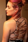 I love the back strap detail. It makes this dress so unique. It took some help from my boyfriend, but it's comfortable and totally doable! - Melanie K.