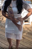 I wore this as one my day dresses for my bachelorette trip in Miami! And in honeymoon in Hawaii!! It wasn't too bad with the heat and all. Dress up or down with this one! The material fit perfectly around my bum and a separate piece around my bust.

I loved this dress so much I bought it in white for my bridal shower ! - Laura T.