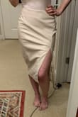 Size down for a sexy look! I'm a size 4 and I bought this in a small and it technically fits me but it does not hug my curves the way I wanted it to. I later ordered the black in an XS and it's perfect! - Paige C.