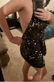 I was really hoping to like this dress but it just wasn't what I expected. I didn't realize there was a ruffle in the front of the dress (the pictures are kind of deceiving), which ruined it for me. Plus, even for a large-chested girl, it was way too loose up top due to excess fabric on the sides (hard to tell, but picture for reference). I'm not sure how anyone would fit in this dress without getting it adjusted somehow up top but I think it's just the way it's made so a size change wouldn't work. The bottom half fit nicely. Dress also had more silver in person. Material was okay, kind of cheap looking. Ended up returning. - Madelyn D.