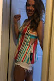 This top is so unique and fun! I love the open back. I am 5'7 150 lbs- athletic build and a med was perfect. - Jenine R.