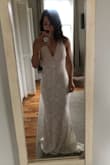 We're eloping but having a family lunch the next day to celebrate, so I bought this dress to wear during the relaxed reception. I intend to wear flats, so I will have to get it hemmed and will probably lose the small train. Otherwise, it fit perfectly. It's amazing quality, a nice, heavier material but not so heavy that it's uncomfortable. It's lined well, so I'll have no concerns of it being see-through while I wear it. - Emily D.