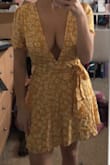 This dress was a bit happy at the top which surprised me cuz dresses are usually tighter around my chest. I do think this dress is cute, just not with my body type. I would not recommend buying this if you have a bigger chest!! - Jenna L.