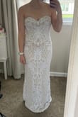 This dress fits like a glove - no need for alterations! It looks more expensive in person. Pictures do not do this dress justice!! I am going to wear 2-3" heels to compensate for the length. It's going to match my ivory veil perfectly - I am in love! - Yvonna W.