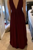 Love material but there was way too much fabric on the small dress it looked like it was swallowing me up and did not show any of my figure so I sized down to an xs which is almost right but I'll keep it. - Madeline