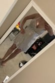 This dress is going to be perfect for Vegas for my bachelorette party! it does have a little clasp on the front if you wanna button it up to show a little less but hey its Vegas so I won't lol, the straps are adjustable and since I had to have my 4 year old zip me up, I didn't ask him to adjust the straps but ill ask my fiancé to do so and it'll be awesome! - Danielle B.
