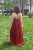 I bought this dress for my sister's wedding. It's so fun to wear and looks really flattering. I like that the straps can adjust to change the way the top fits. My sister tried it on (we are built differently) and it looked great on her too. A very flexible dress. It is a little bit long. - Kristina R.