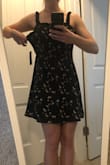 The fabric, color, and pattern are a perfect match for the pictures online. Truly adorable! Unfortunately, this dress runs very big. I am a medium in skater dresses 99.9% of the time... too bad this is the .1%. The chest, waist, and straps are all too big. Size down! - Kayla H.