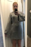 The fabric is lovely... not itchy at all! The belle sleeves are definitely oversized but a nice contrast to the body of the dress. I have a booty, and this dress cut nicely in the back without being tight (AKA work appropriate with tights). However if you have any tummy pooch at all, it will be visible! Fair warning! - Kayla H.