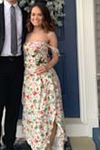 This dress is beautiful!! I wore it for our "at home" prom. I love the floral print. The slits appear a little high in some photos, even on a short person like me. I also am not a big fan of the cutouts, but it's easy for me to fold them under and pin them shut. It really is a gorgeous dress though & I got so many compliments! - Alexandra W.