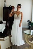This dress is amazing! It is exactly as pictured and all the other reviews were right on point. You won't be disappointed. It is well made, elegant, and fits well. I may have it taken in an inch in the back as it is a tad loose there, but I couldn't go down because of my cup size. - Andra B.