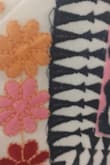 LOTS of skipping thread like shown in the picture. Can't tell from 6 feet away but it bothers me. I may keep it just for the cuteness. Not a satisfied purchase by any means! - Jin C.