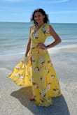 I love the dress, it's simple to tie and fits perfectly around the chest. However, the dress is a tad bit long for us short girls. I constantly tripped over the bottom of the dress and because of the slit its a little uncomfortable lift it to walk. Other than that I love it so much!! - Nnenna O.