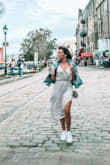 Usually wear an XS, but it was sold out so I got a S and it's fine! Love that you can cross the straps in front for a different look. Very comfy. Cute with sneakers, sandals, wedges, whatever! - Sarah R.