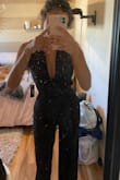 This jumpsuit is super sexy and classy at the same time! It's really flattering on the body and hugs your hips in a good way to show off your curves. - Callie R.