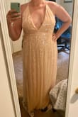 I bought this dress to wear as my wedding dress. I'm a tall, curvy girl (size 14) and ordered a size XL. The length is perfect, but it's a bit too tight around the waist. I'll have to do some minor alterations to make it fit more comfortably. Would I purchase this dress again? Absolutely. My one suggestion would be to offer a wider range of sizes for us curvy girls who still want to look sexy! - Liz S.