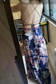 It's a nice light material which is perfect because I bought the dress for a wedding in Jamaica. I am usually unsure about trying to wear dresses with a back like this because I am a DD, but it holds pretty well. I might use a little boob tape but overall I think it does a good enough job. If you are shorter and need to order up because of a larger chest like me, you will definitely need to get the bottom taken up a couple of inches. Otherwise, great find :). - Nicole S.