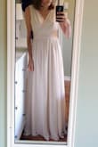 This dress is comfy which says something, because I'm very picky when it comes to comfort. It has a float 3 layers at the bottom. Good for warm and cold weather

It's a little small in the waist and big in the bust, but i knew that when i bought it. It's a little too long for flats. Not sure about heels, but I'd rather it be too long. - Dayna B.