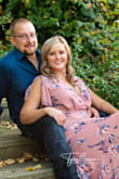 Is absolutely love this dress! I wore it for my engagement pictures! The neck line does plunge some and is a little uncomfortable because I don't want to show off my girls! I plan on getting it fixed so it's not as revealing! - Lydia L.