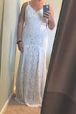 Great quality, beautiful fabric. Exactly what I expected. But I'm 5'4" and tried it on with 4 inch heels and it still needs 2-3 inches of alterations. I was sad to return it but my schedule did not allow alteration times. It wasn't the most flattering from the front because I'm a bit boxy but I still loved it. Wish Lulus has petite or short options for their dresses! - Allie L.