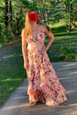 I love this dress, it's got a gorgeous print and really conceals the belly area well. However, the top part that covers the breast area tends to roll out and show the inner lining and it is super low cut, so it shows more chest area than I would like. Overall, it's a great dress and I've gotten a lot of compliments! Would buy again. - Adrienne A.