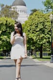 The dress has a yellow tint to it, didn't like the fit. Can't really tell in the picture but in person, it wasn't what I expected. - Delia M.