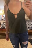 This top is adorable. The material is silky and feel like good quality. You can even where this without a bra because the material is so thick. I love how the bottom fold under it makes it look like you have the shirt tucked in. I definitely hope to buy more colors in this exact top! - Lauren N.