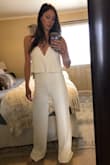 This jumpsuit is perfect! The material stretches a bit and forms to your body. Doesn't smash your chest and stays up. I am tall and the length is great, I can pair with wedges for comfort. A little worried if I eat too many tacos but that's what shape wear is for! :) - Tara M.