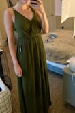 I was looking for an olive green dress for an outdoor wedding I am in this August in TN (aka going to be very hot). After reading reviews, I went out on a limb and ordered this dress. While the color is much darker in person than the picture, I am pleased with it. It fits me well and will definitely help me to stay cool in the southern heat. I am relatively tall at 5'7" so dress length is always a concern for me with long dresses, and I will comfortably be able to wear a 2-3" heel with this dress! I also have an average bust, so the chest is not too snug, too loose, or too low cut which is often a concern with backless dresses like this one. Good quality at an affordable price! - Hailey S.