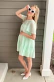 Love this dress. Ordered a size small - I'm currently 26 weeks pregnant and it's perfect for a growing bump. It will last me the entire pregnancy and afterwards since it isn't technically maternity! Recommend it for anyone! Wore it with both keds and heels. - Abby F.